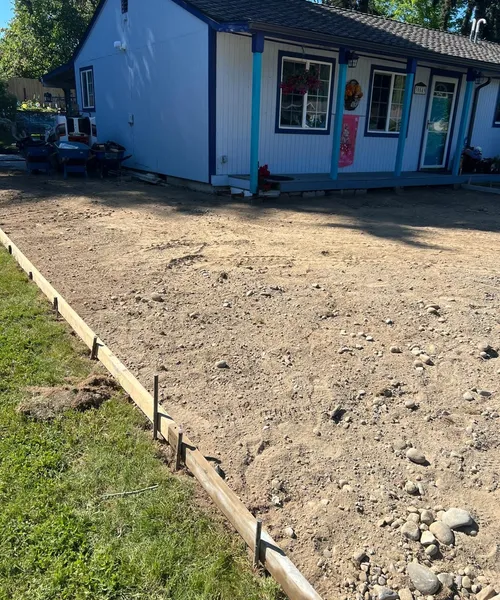 Broom finish driveway and decorate borders in Federal Way 